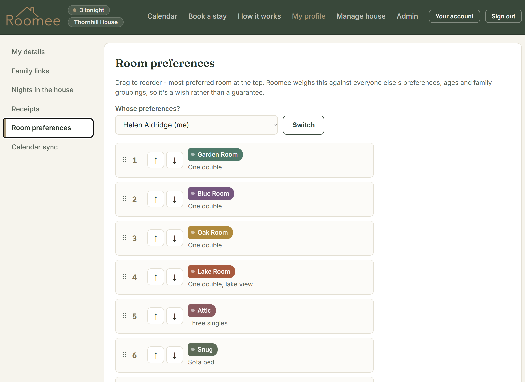 A person ordering the bedrooms from most to least preferred by dragging them
